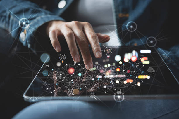 Close-up of a person using a digital tablet, with overlaid graphics representing digital marketing and network connections, including icons like email, analytics, social media, and cloud computing. best digital marketing freelancer in malappuram
